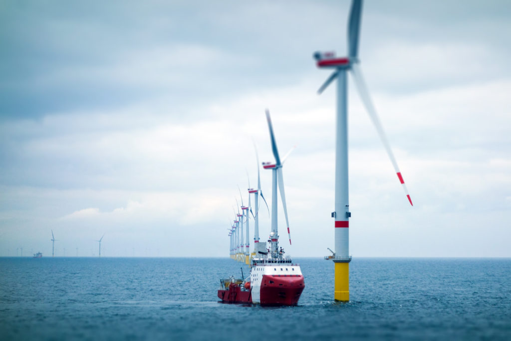 Wind-turbine, offshore, worker, boat, sea, sun, vessel