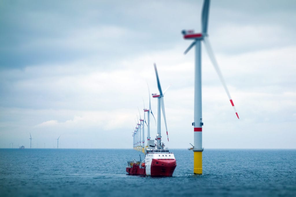 Wind-turbine, offshore, worker, boat, sea, sun, vessel